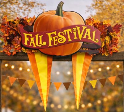 Fall Festival themed entrance decor with pumpkin sign and banners for a company event