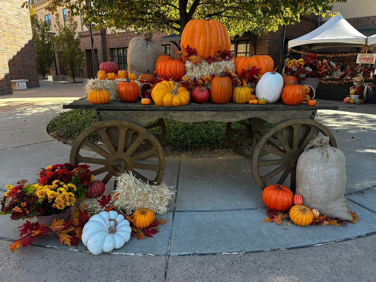 Fall festival themed pumpkin display wagon for a school event