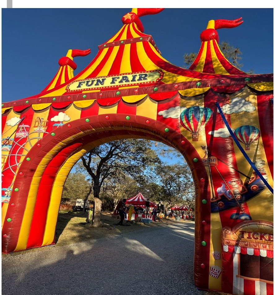 Inflatable Fun Fair entrance arch at a fall festival in the Roseville area