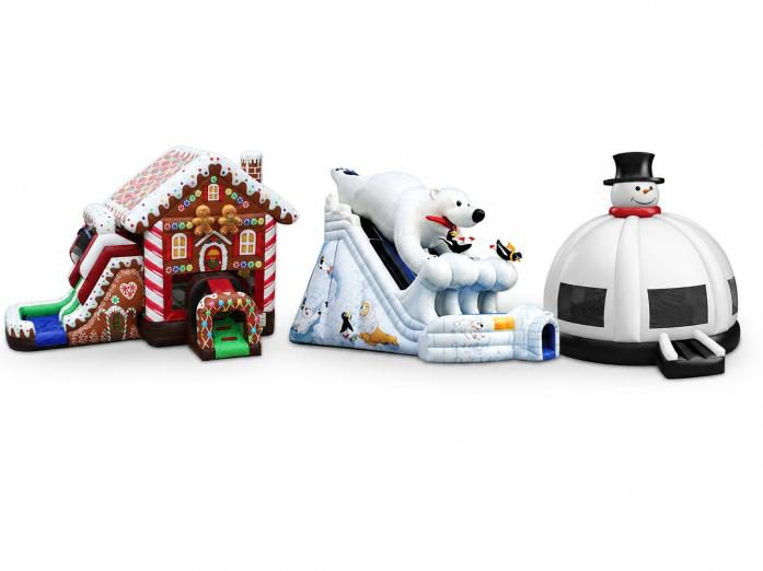 Christmas inflatables including a gingerbread house bounce, polar bear slide, and igloo attraction
